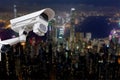 CCTV monitoring, security cameras. Backdrop with views of the city during twilight. Royalty Free Stock Photo