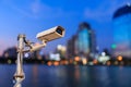 CCTV with night city bokeh background, surveillance camera system for security