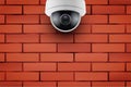 CCTV security camera on brick wall
