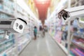 CCTV Security camera shopping department store on background. Royalty Free Stock Photo