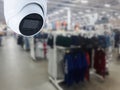 CCTV security camera shopping mall on blurry background Royalty Free Stock Photo