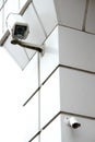 CCTV security camera on the wall outside. Royalty Free Stock Photo