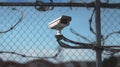 CCTV secutity cameras system and barbed wire fence. Privacy, sec Royalty Free Stock Photo