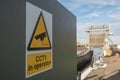 CCTV sign seen attached to an electrical control box. Royalty Free Stock Photo