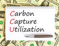 CCU Carbon capture utilization symbol. Concept words CCU Carbon capture utilization on beautiful note. Beautiful dollar background
