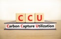 CCU Carbon capture utilization symbol. Concept words CCU Carbon capture utilization on beautiful blocks. Beautiful white