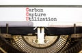 CCU Carbon capture utilization symbol. Concept words CCU Carbon capture utilization typed on typewriter. Beautiful white