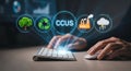 CCUS Carbon Capture Utilization and Storage Technology Concept with Businessman Typing on Keyboard and Icons of Tree Recycle Royalty Free Stock Photo