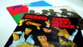 CD albums of the famous English group QUEEN. selective focus on album SHEER HEART ATTACK