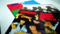 CD albums of the famous English group QUEEN. selective focus on album THE WORKS Royalty Free Stock Photo