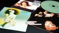 Cd and artwork of the naturalized American Cuban singer and actress GLORIA ESTEFAN