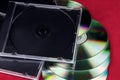 CD Cases and CDs on a Red Background Royalty Free Stock Photo