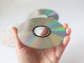 Cd compact disc in the hand on white background Royalty Free Stock Photo