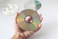 Cd compact disc in the hand on white background Royalty Free Stock Photo