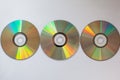 3 cd compact disks with computer drivers in a row on a white background Royalty Free Stock Photo