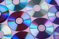 CD DVD compact disc disk dispersion refraction reflection of light colors texture on pink background Royalty Free Stock Photo