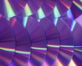 CD DVD disc colorful compact background rainbow shine color pantone ultra violet pink purple deep proton Royalty Free Stock Photo