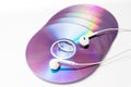 Cd ,dvd disks with headphones Royalty Free Stock Photo