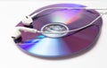 Cd , dvd disks with headphones isolated Royalty Free Stock Photo