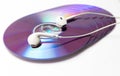 Cd , dvd disks with headphones isolated Royalty Free Stock Photo