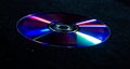 Cd dvd isolated on black, cd dvd background, disk in the dark Royalty Free Stock Photo