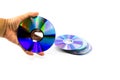 CD-ROM disc with rainbow reflective light on man hand isolated Royalty Free Stock Photo