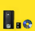 CD-ROM and video tapes as a concept of evolution of media storage. Storage media of the past Royalty Free Stock Photo