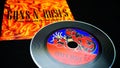 CDs and artwork of the American hard rock band GUNS AND ROSES. `The spaghetti incident?` is the fifth studio album made up of cov