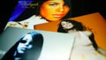 CDs and artwork of the American singer, actress, and model Aaliyah