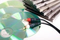 CDs And Cases with audio cable. Royalty Free Stock Photo