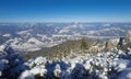 Ceahlau mountain and frozen lake in winter landscape.