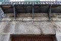 Stone lintel with Latin words on a house in the town of Cebreros, Avila, Spain