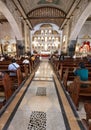 Devout Filipino worshipers of all ages, gather for worship,inside the iconic Basilica of Saint Nino,Cebu\'s oldest church