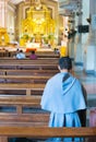 A young Catholic monk prays at Cebu Metropolitan Cathedral,during an afternoon visit