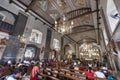 Devout Filipino worshipers of all ages, gather for worship,inside the iconic Basilica of Saint Nino,Cebu\'s oldest church