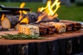 cedar plank grilling provolone cheese over hot coals
