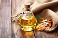 cedarwood oil in glass bottle with wooden chips next to it