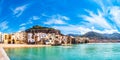 Cefalu, medieval town on Sicily island, Italy. Seashore village with beach and clear turquoise water of Tyrrhenian sea Royalty Free Stock Photo