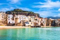 Cefalu, medieval town on Sicily island, Italy. Seashore village with beach and clear turquoise water of Tyrrhenian sea Royalty Free Stock Photo