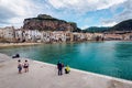 CEFALU, SICILY / ITALY - OCTOBER 5, 2018: Tourists walking in the Cefalu city in Italy