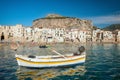 Unidentified people on sandy beach in Cefalu, Sicily, Italy Royalty Free Stock Photo