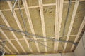 Ceiling construction detail. Close up on ceiling construction details with electricity wire. Building construction gypsum plaster