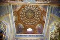 Ceiling decorated with gold and mosaics inside the the Ulugbek Madrasah on Registan Square in Samarkand. 29.04.2019 Royalty Free Stock Photo