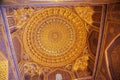 Ceiling decorated with gold and ornamentation inside Tillya-Kori, Sherdor, Ulugbek madrasah on Registan Square in Smarkand in