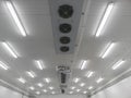 Ceiling of factory interrior with boxes of an industrial refrigerator