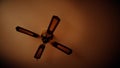 Ceiling fan. Creating air coolness on hot days. Dramatic cinematic atmosphere