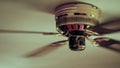 Ceiling fan. Creating air coolness on hot days. Dramatic cinematic atmosphere