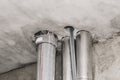 Ceiling fire metal round pipes Insulation system on construction site Royalty Free Stock Photo