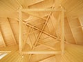 Ceiling with geometric pattern of wooden beams Royalty Free Stock Photo