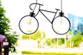 Ceiling lamp. Light fixture made in the shape of a bicycle. Royalty Free Stock Photo